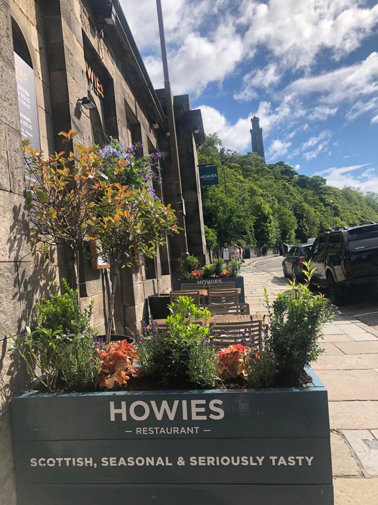 Howies Restaurant exterior with Calton Hill in background