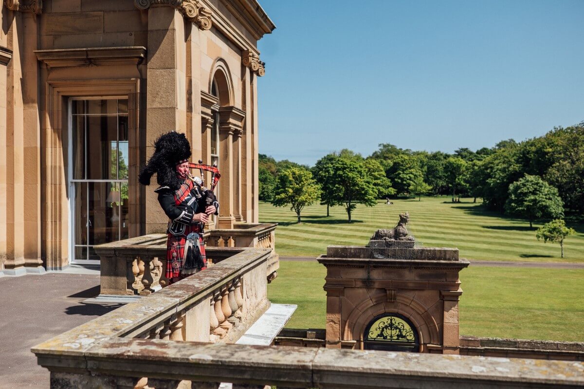 Piper playinh at an outside catering event by Howies, Scotland