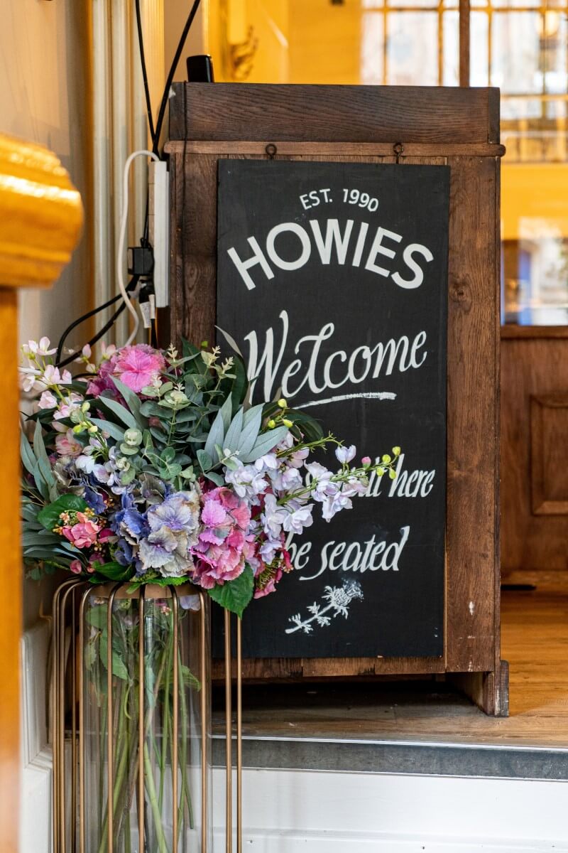 Welcome sign at Howies Restaurant, Victoria Street, Edinburgh